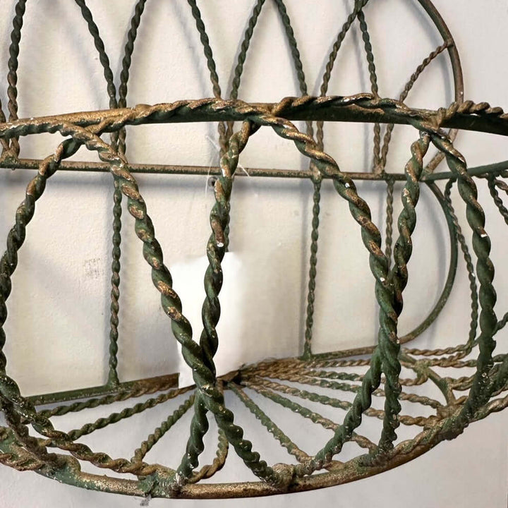 Vintage Wrought Iron Wall Basket Planter with Scrollwork Design featuring rustic detailing and timeless craftsmanship