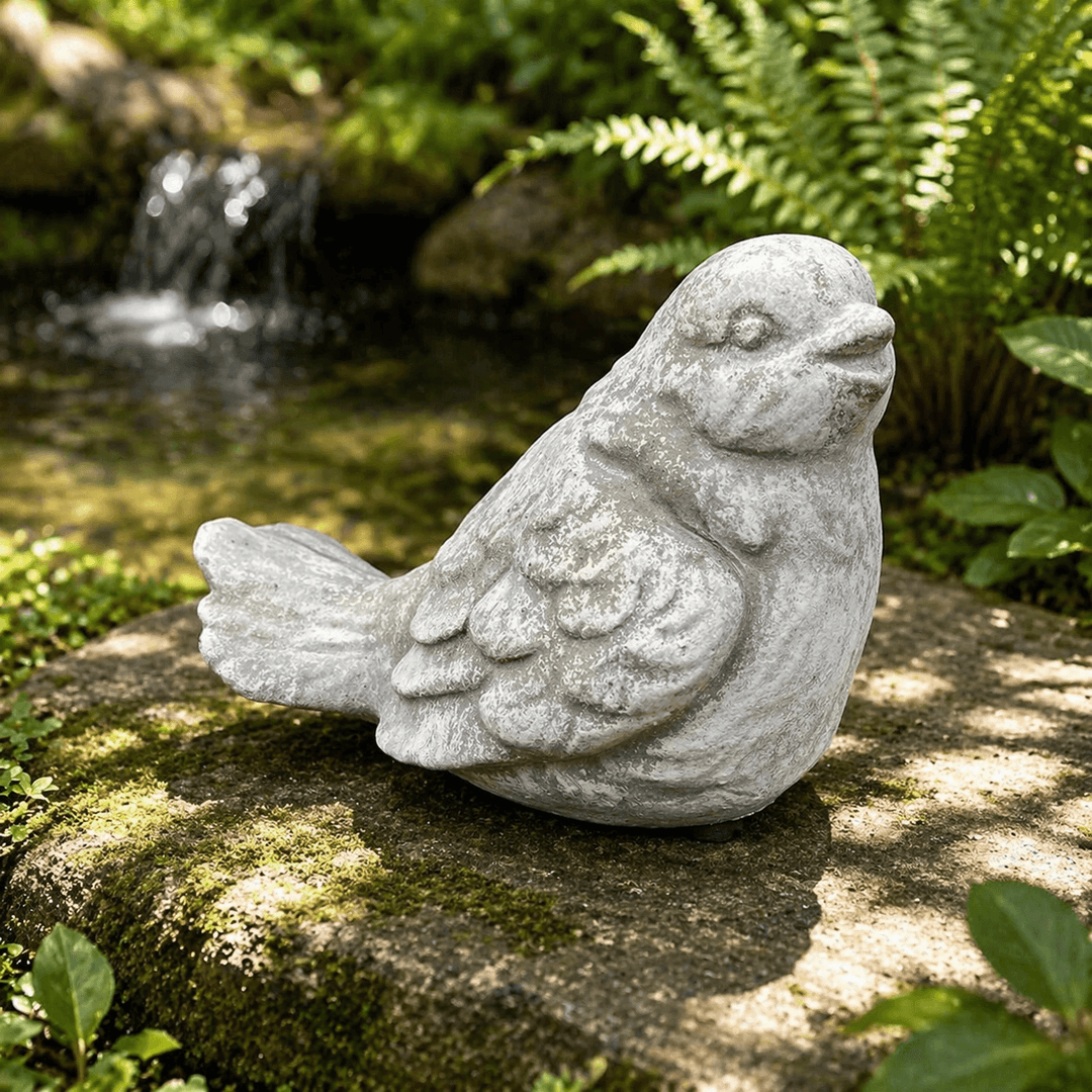 Weathered Cement Bird Garden Statue with layered wing and tail detail