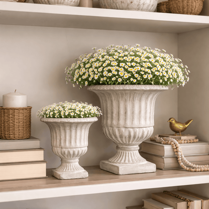Small Weathered Cement Pedestal Urn Planter with a succulent on a windowsill