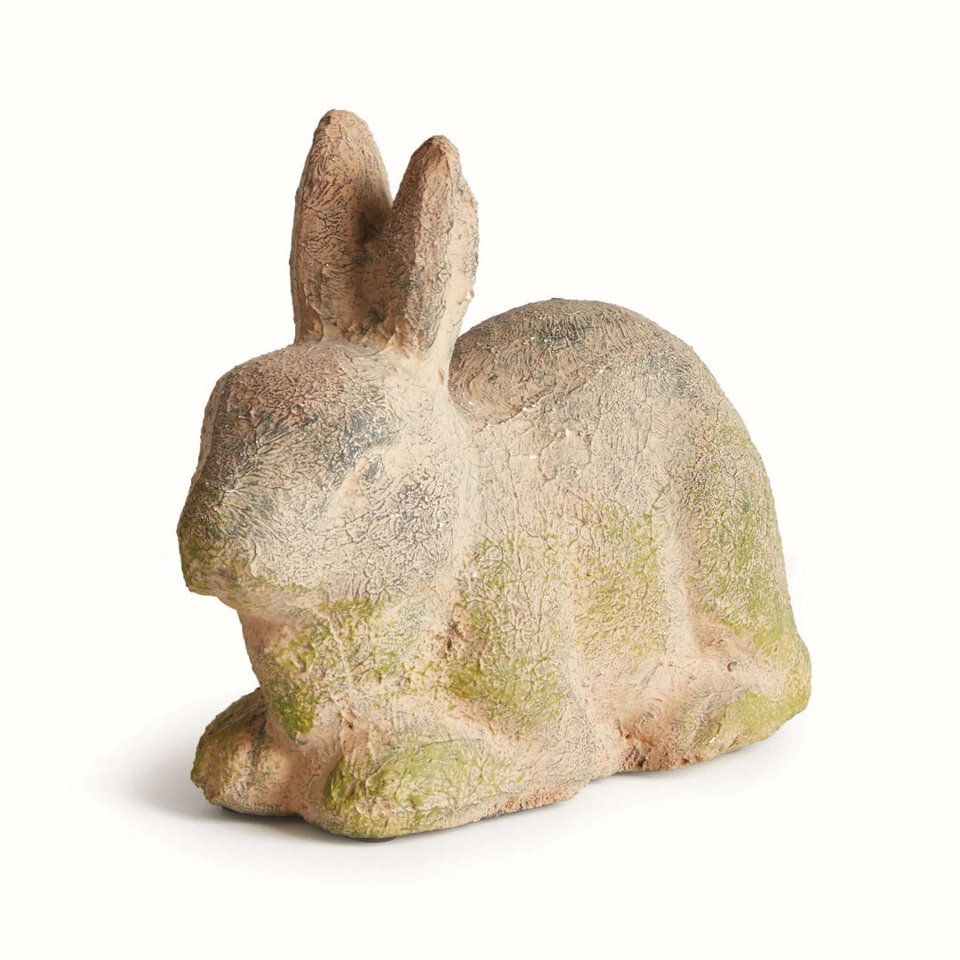 Weathered moss terracotta bunny garden statue, vintage style rabbit sculpture for outdoor decor.