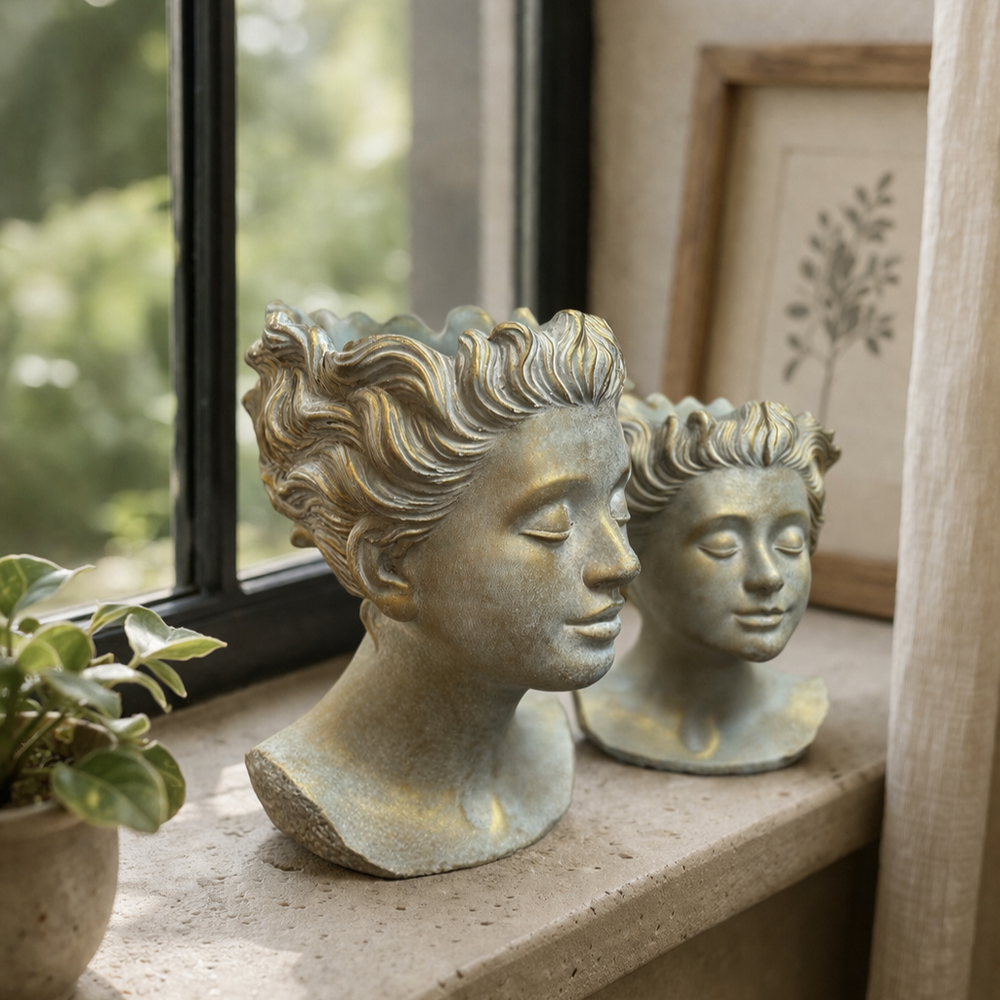 Weathered Roman Bust Planters styled on a sunlit windowsill