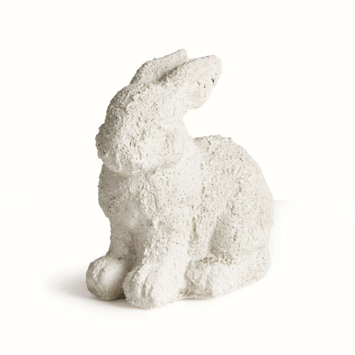 Weathered terracotta bunny garden statue, soft aged white finish, perfect for charming outdoor decor.
