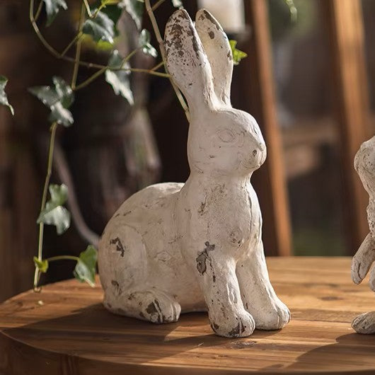 Seated Weathered White Bunny Figurine with long upright ears