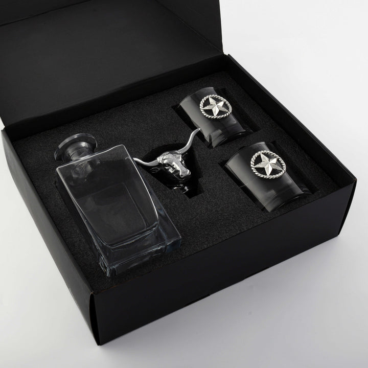 Western Longhorn Whiskey Decanter Set with Glasses in gift box, showcasing crystal decanter and metal accents for whiskey enthusiasts.