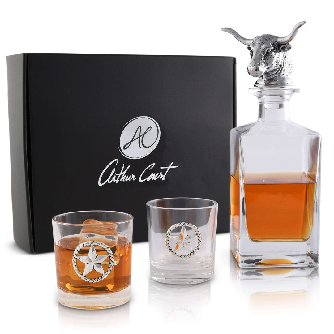 Western Longhorn Whiskey Decanter Set with Glasses featuring crystal-clear glass and metal accents, perfect for whiskey enthusiasts.