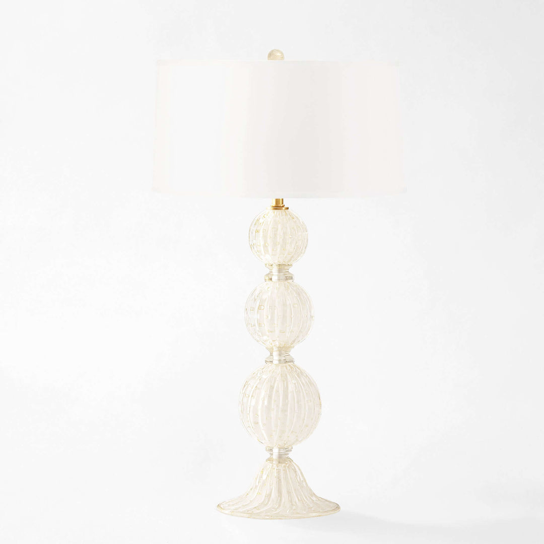 Decorative lamp with three spherical shades on a white background