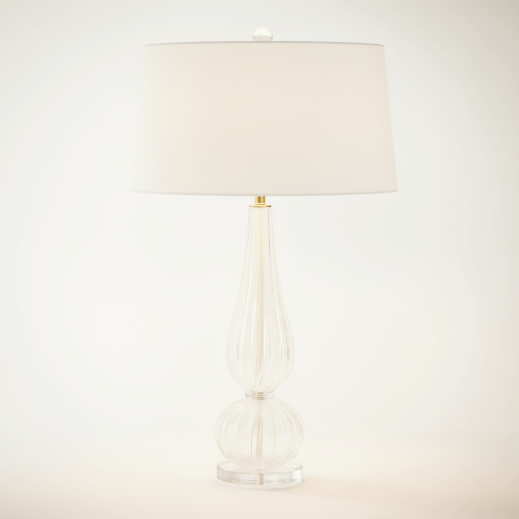 Table lamp with a beige shade on a white background