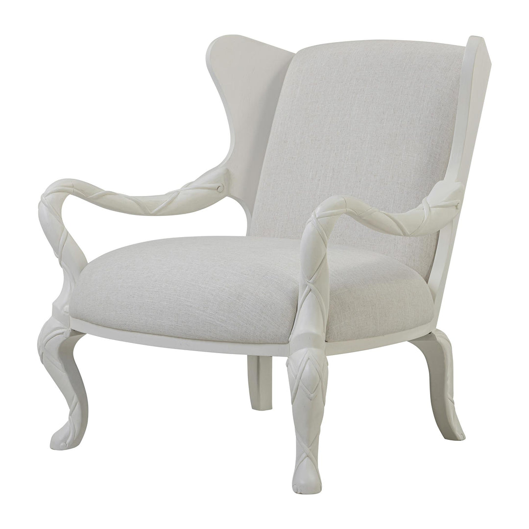 Whitewash ribbon wing chair with ivory upholstery, viewed from the front at an angle.