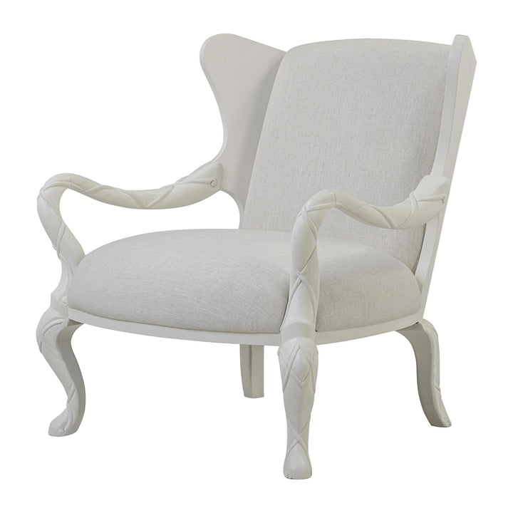 Whitewash ribbon wing chair with ivory upholstery, viewed from the front at an angle.