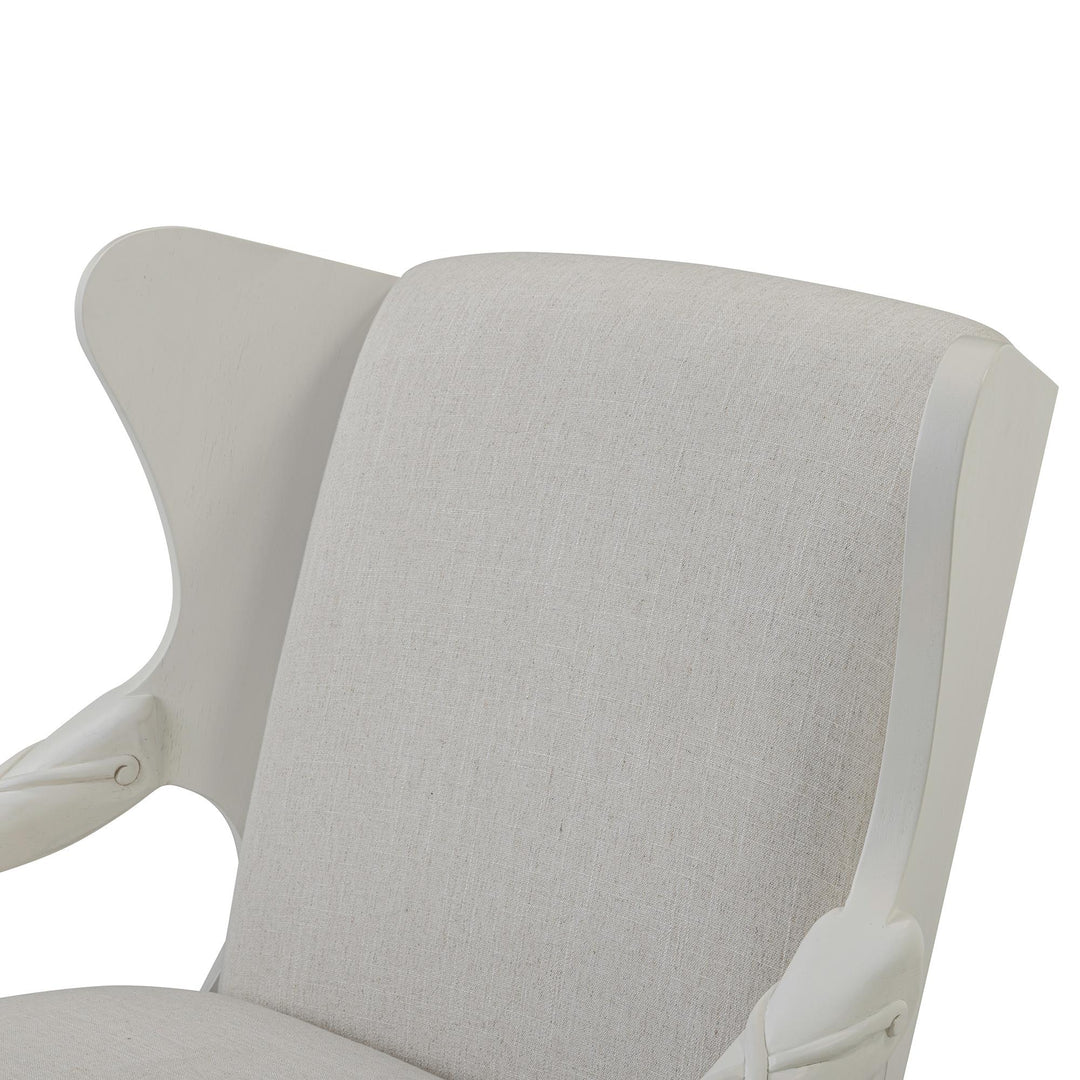 Close-up of the ivory back upholstery and whitewash wing detail.
