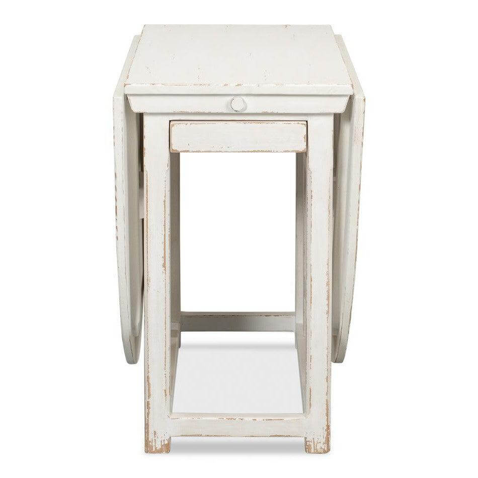 Whitewashed Vintage Dropleaf Table with Distressed Wood Finish, featuring a rustic farmhouse design, ideal for elegant dining spaces.