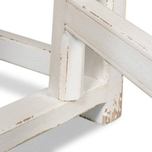 Close-up of leg details on Whitewashed Vintage Dropleaf Table with Distressed Wood Finish, showing farmhouse style and craftsmanship.