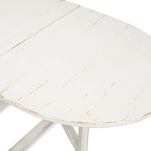 Whitewashed Vintage Dropleaf Table with Distressed Wood Finish showcasing its elegant design and craftsmanship.