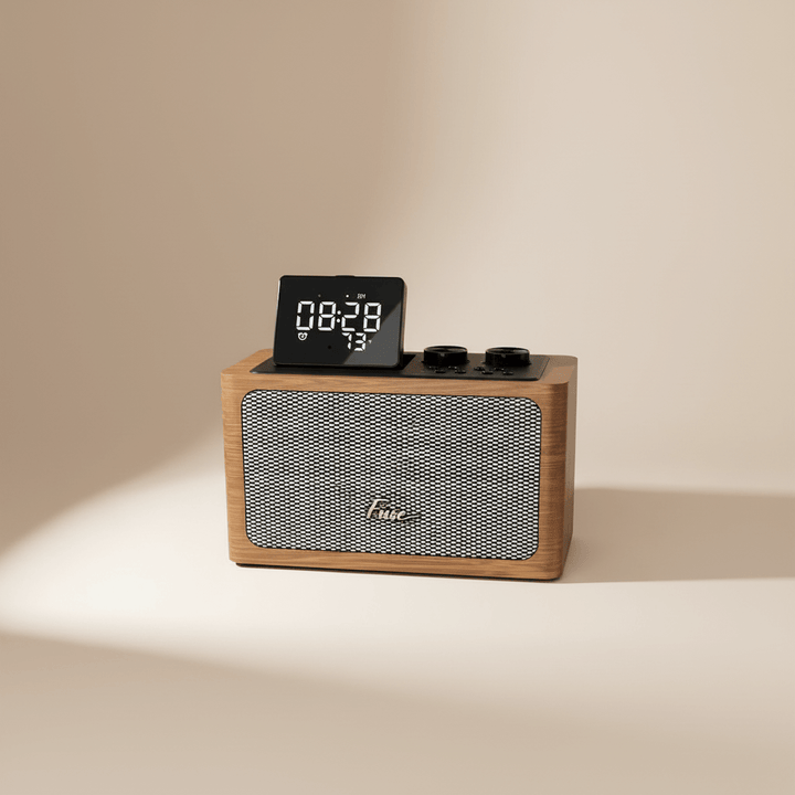 Wooden clock radio with digital display on a beige background